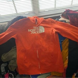 Orange North Face Zip up hoodie jacket